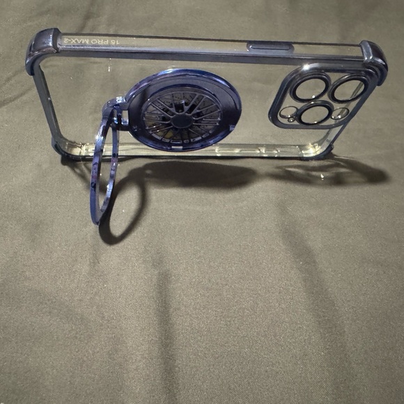 Clear Phone Case with Blue Accents For a 15 Pro Max. Spinning wheel in Center. - Picture 7 of 14
